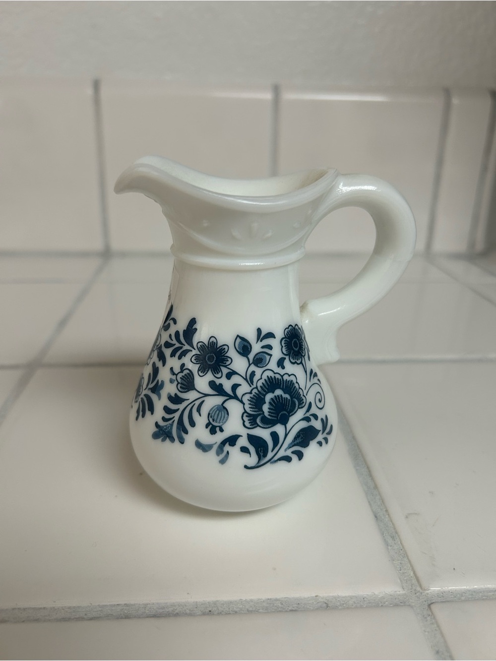 Avon White Ceramic Mini Pitcher with Blue Floral Design
